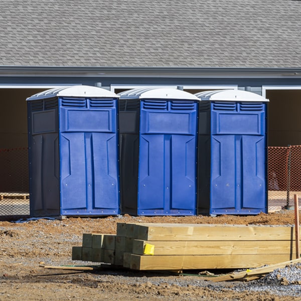 what is the cost difference between standard and deluxe portable toilet rentals in Mecosta MI